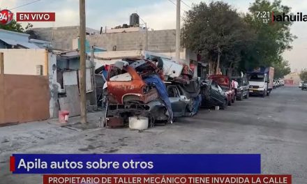 Vecinos hartos de taller mecánico en Loma Linda que apila autos chatarra en la banqueta